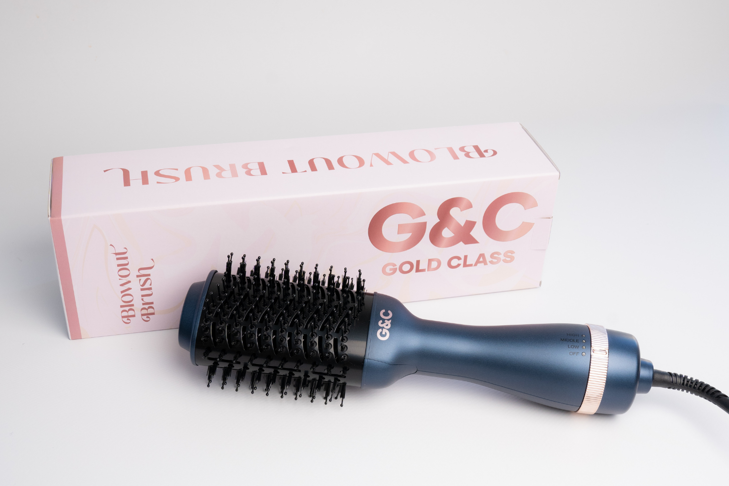 gc-gold-class-blowout-brush-model-holding